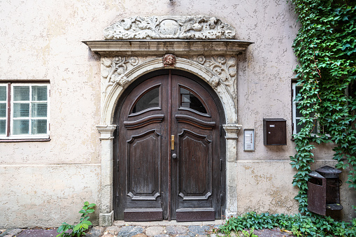 Riga, Latvia. 22 August 2021.   the entrance door of an old house in the city center