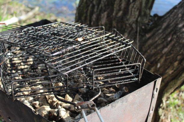 istock barbecue grates and a grill with coals 1337049431