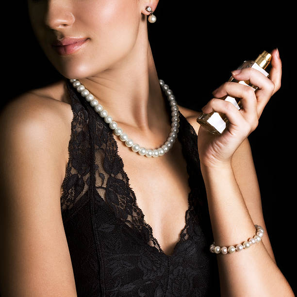 Elegant woman with perfume