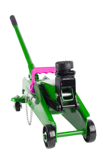 istock green hydraulic car jack isolated on white background 1337055426