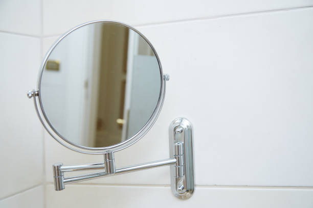 istock round mirror on a stand on the wall in the bathroom 1337057246