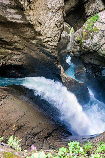 istock Trummelbach Waterfall in Lautenbrunnen. A glacier waterfall system located inside the mountain with narrow paths and picturesque views. 1337058729