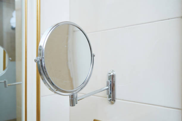 istock round mirror on a stand on the wall in the bathroom 1337058799