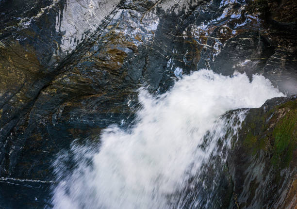 Trummelbach Waterfall in Lautenbrunnen. A glacier waterfall system located inside the mountain with narrow paths and picturesque views.