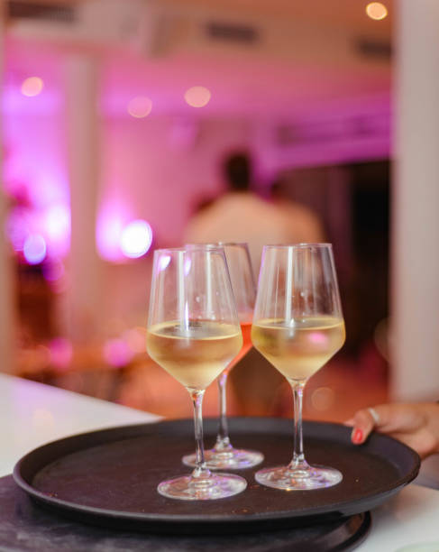 istock Three glasses of white wine served in a restaurant 1337059510
