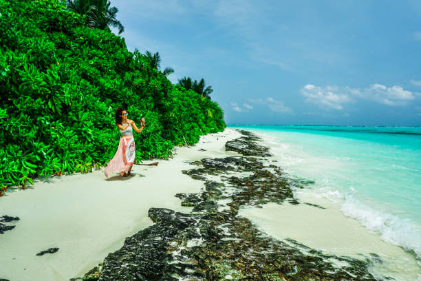 istock Sea view from tropical beach with blue sky. 1337063796