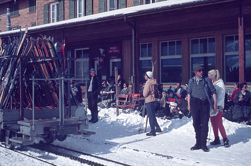 Bernese Oberland, Switzerland, 1959. Winter vacationers at the train station in 