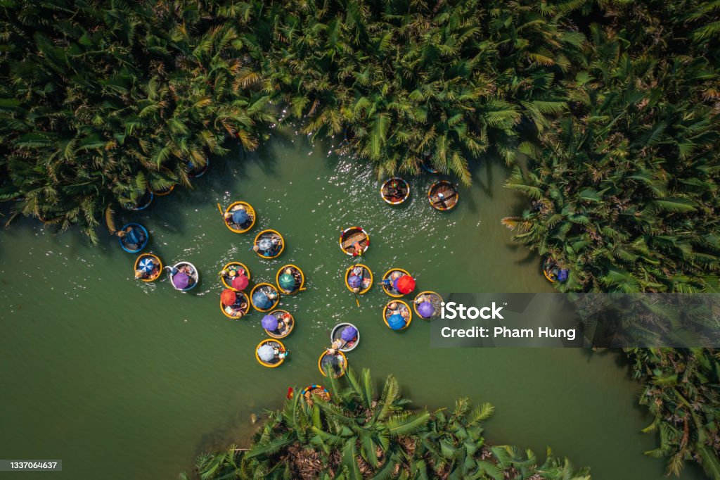 Basket boat tour view in Bay Mau nipa palm jungle Drone view Basket boat tour view in Bay Mau nipa palm jungle, Hoi An, Quang Nam province, central Vietnam Vietnam Stock Photo