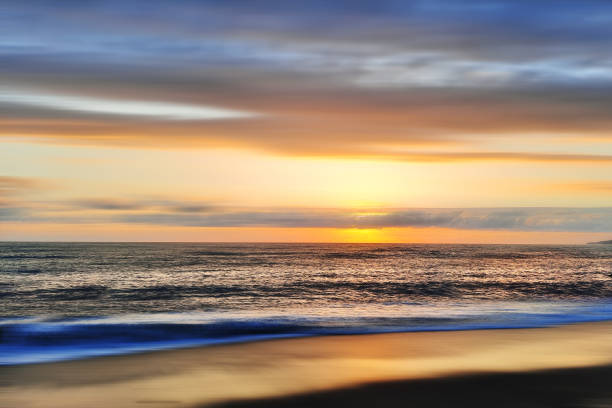 istock Beautiful sunset over the sea, blurred background for design. 1337066866