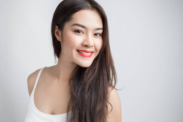 istock Young beautiful Asian woman with smiley face. 1337068595