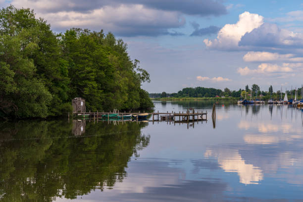 Steinhude, Lower Saxony, Germany - June 08, 2020: View at the Steinhuder Meer with a jetty and the marina near the bathing island
