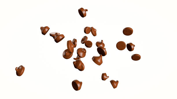 gocce di cioccolato bocconcini o gocce, caduta volante - brown chocolate candy bar close up foto e immagini stock