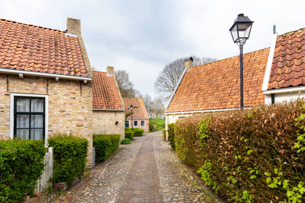 Dutch fortified little village Bourtange in The Netherlands Street view of the Dutch fortified little village Bourtange in Westerwolde, Groningen in The Netherlands medieval architecture stock pictures, royalty-free photos & images