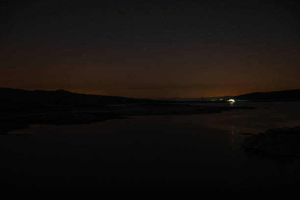 istock night sky with stars in a river with calm waters 1337081926