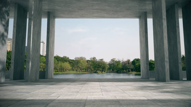 istock Empty space for products show in concrete hallway with park background. 1337082226