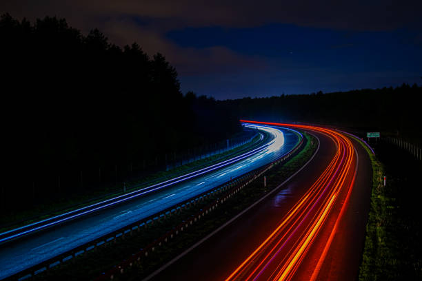 istock lights of cars with night. 1337083191