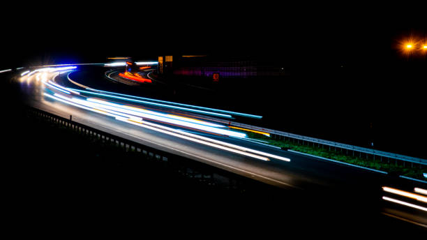 istock lights of cars with night. 1337083411