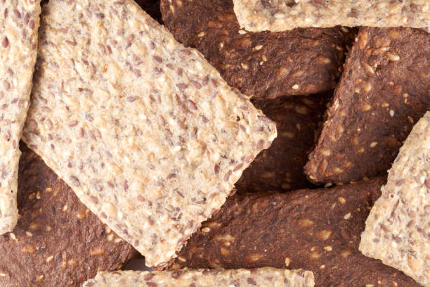 istock Whole grain crispbread background, healthy snacks 1337083741