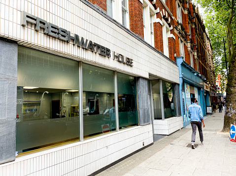 People walking past Freshwater House in Seven Dials, London