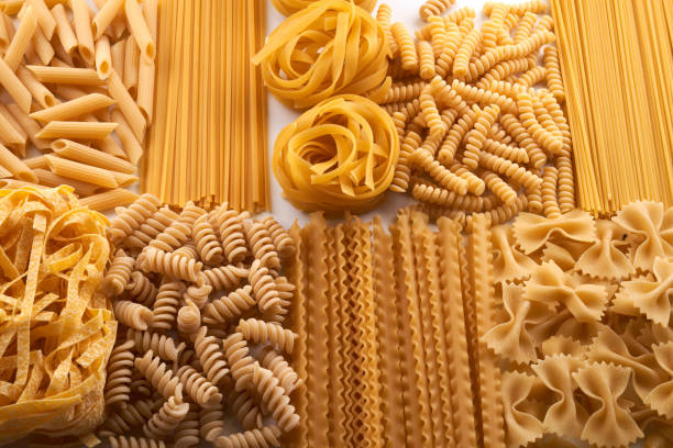 istock Assorted varieties of pasta background. Mix macaroni 1337087683
