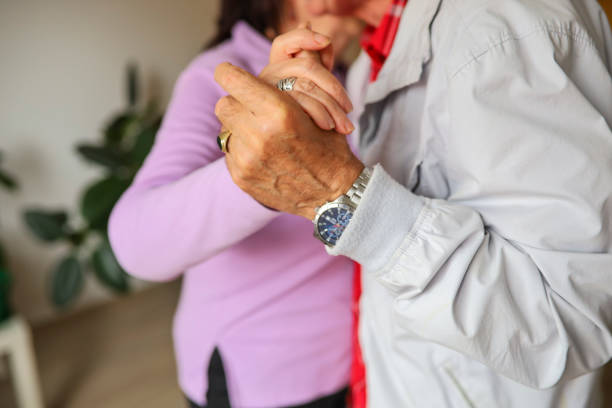 istock Senior couple holding hands 1337097548