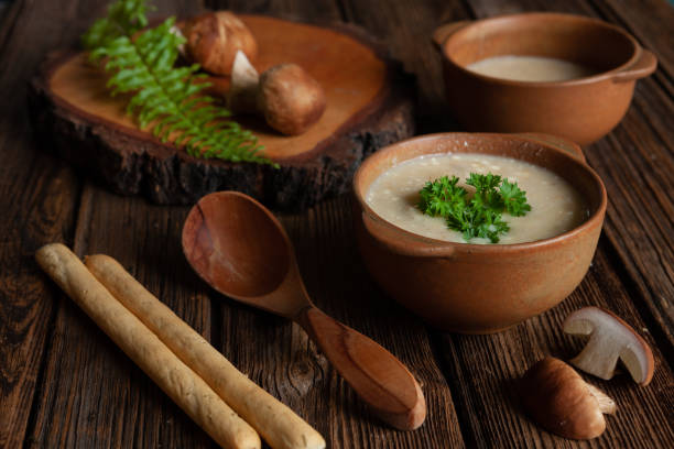 istock Cream soup from fresh forest mushrooms cep, boletus. Top view, close-up 1337100655