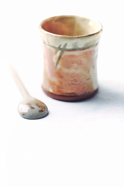 istock Traditional, handcrafted ceramic on bright wooden background. Soft focus. Close up. Copy space. 1337100774