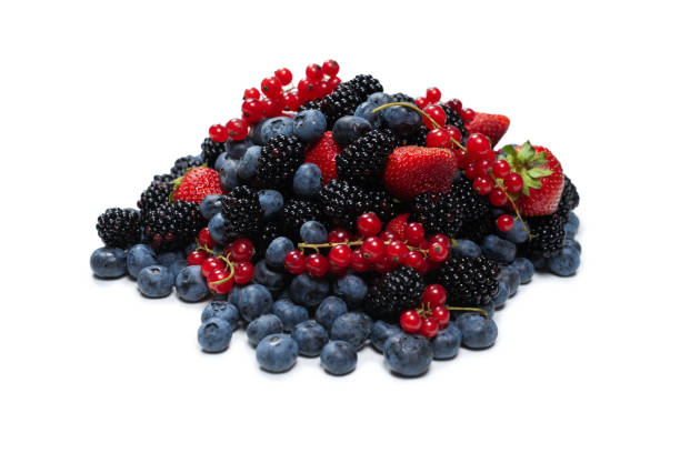 istock Blackberry, raspberry, blueberry,  red currant and mint background. 1337102863