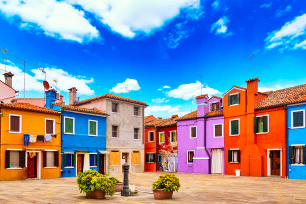 beautiful vibrant colorful houses in burano, near venice in italy. - house residential structure multi colored burano imagens e fotografias de stock