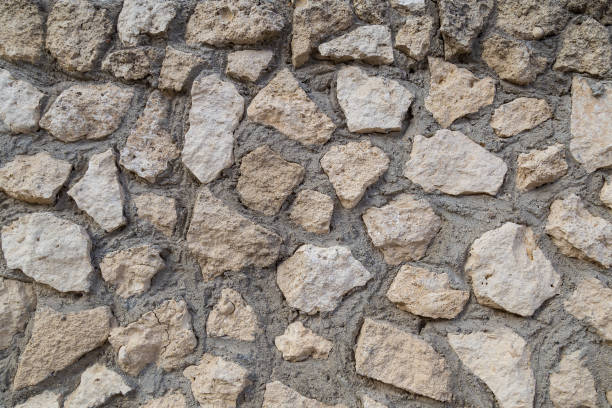 istock Old rough textured surface of a grunge wall 1337109377