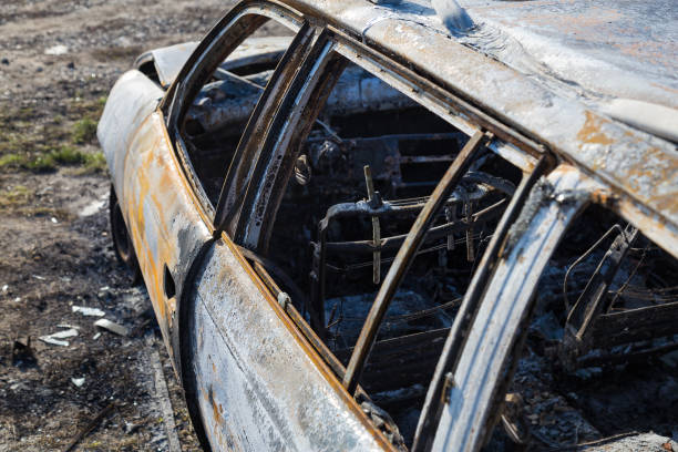 istock Burned down car, abstract background, selective focus. The situation of protests in the world. 1337110015