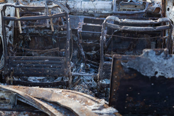 istock Burned down car, abstract background, selective focus. The situation of protests in the world. 1337110466