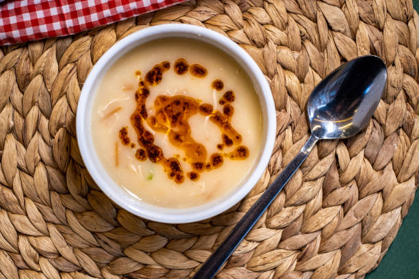 istock Creamy chicken soup with butter 1337110525