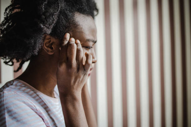 istock Woman has a headache and depression 1337111055