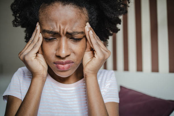 istock Woman has a headache and depression 1337111859
