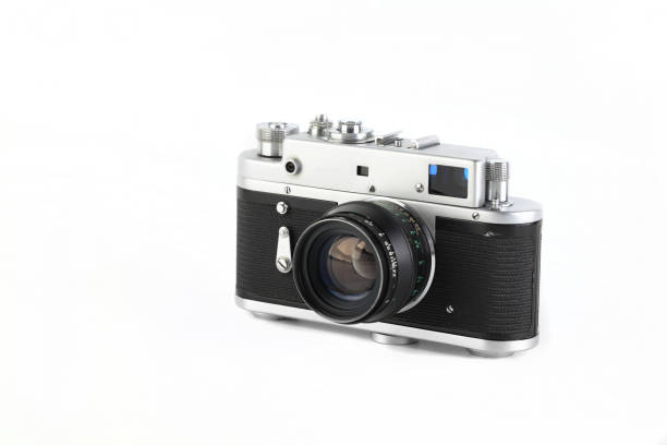 istock Old rangefinder film photo camera on white background. 1337113202