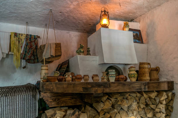 istock Clay jugs and pots. Vintage traditional rustic tableware on the oven shelf 1337115638