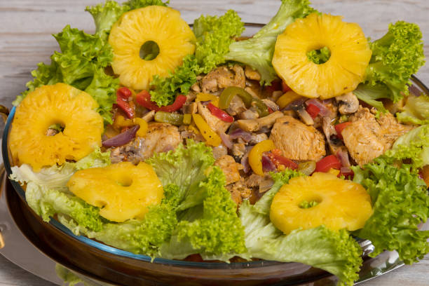 istock Pineapples with chicken meat in vegetables. Culinary background with selective focus 1337118167