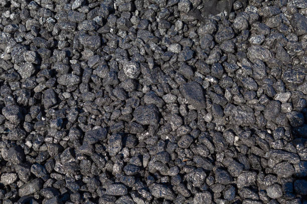istock Natural black coals for universal illustrative background. Industrial coals. 1337118845