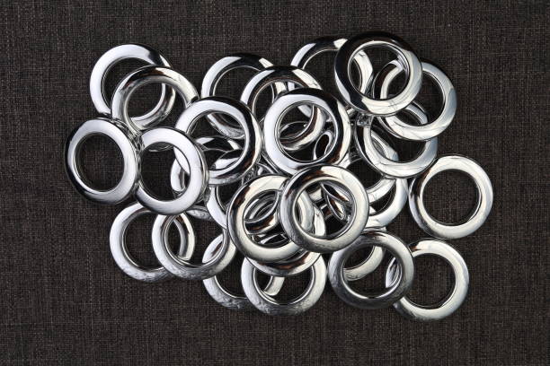 Pile of Fishing Hooks on an Old  Wooden Surface