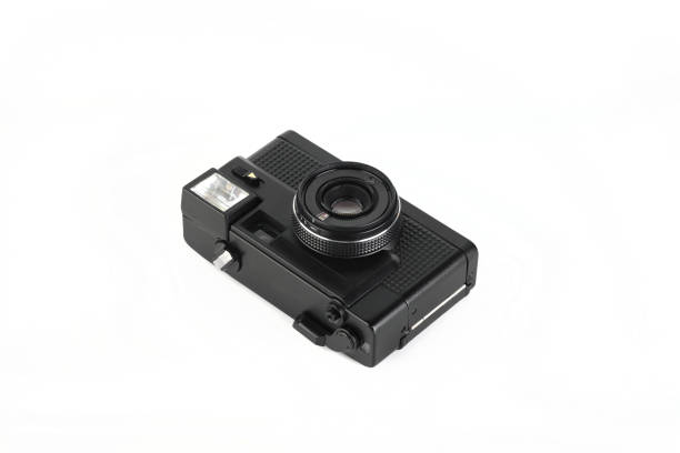 istock The old 35mm. automatic scaling film camera on white background. 1337131948