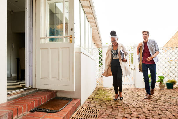 istock Real estate agent showing a house to client 1337141328