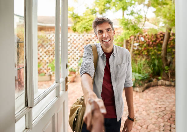 Real Estate Agent shaking hand with potential client