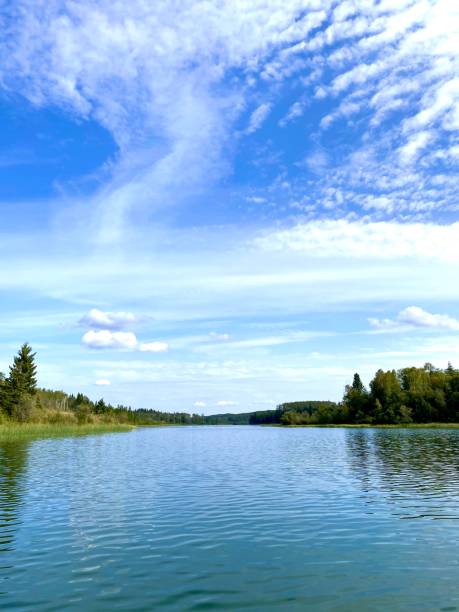 istock Blue Sky and Rippled River Water 1337142867