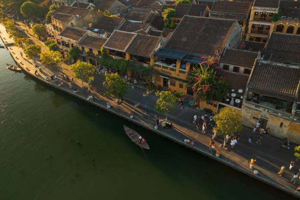 Sun light on Hoi An ancient town Drone view Thu Bon river of ancient town Hoi An, Quang Nam province, Vietnam. thu bon river stock pictures, royalty-free photos & images