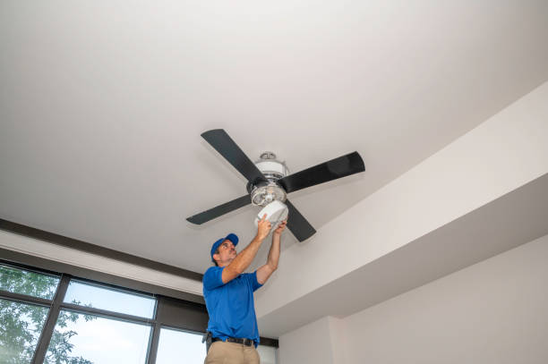 istock Handyman removing light cover on fan 1337152211