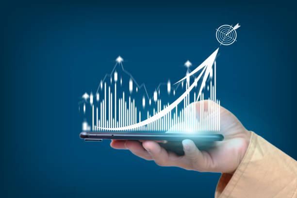istock Businessman plan graph growth and increase of chart positive indicators in his business, showing holographic graphs and stock market statistics gain profits, Concept of growth planning 1337166484