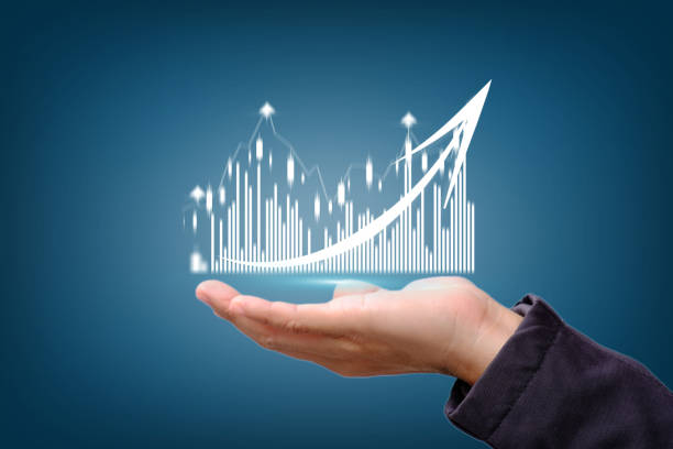 istock Businessman plan graph growth and increase of chart positive indicators in his business, showing holographic graphs and stock market statistics gain profits, Concept of growth planning 1337166540