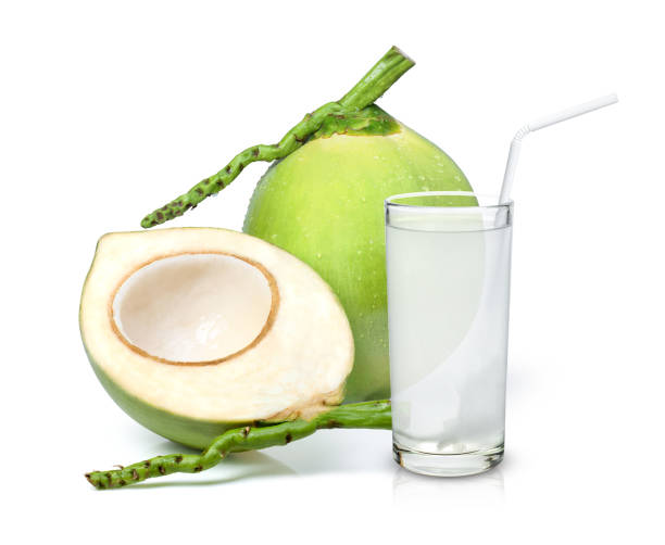 istock coconut water and  green coconut fruit isolated on white background. 1337167221