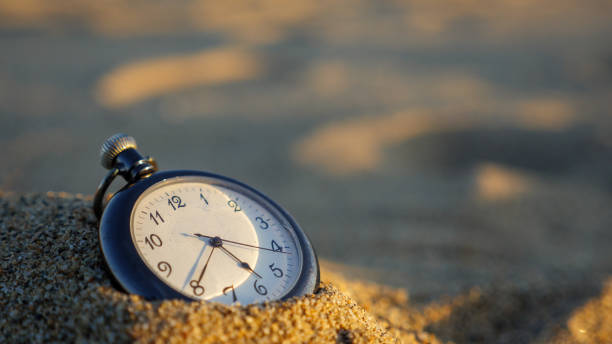 A pocket watch that ticks on the beach